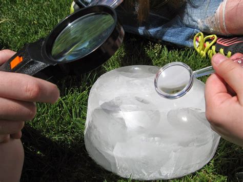 How do you melt glass with a magnifying glass?